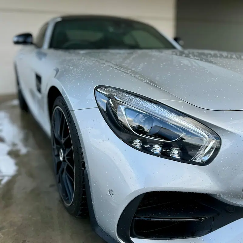 Water beading on a silver Mercedes-AMG coated with OzoneShield True Graphene